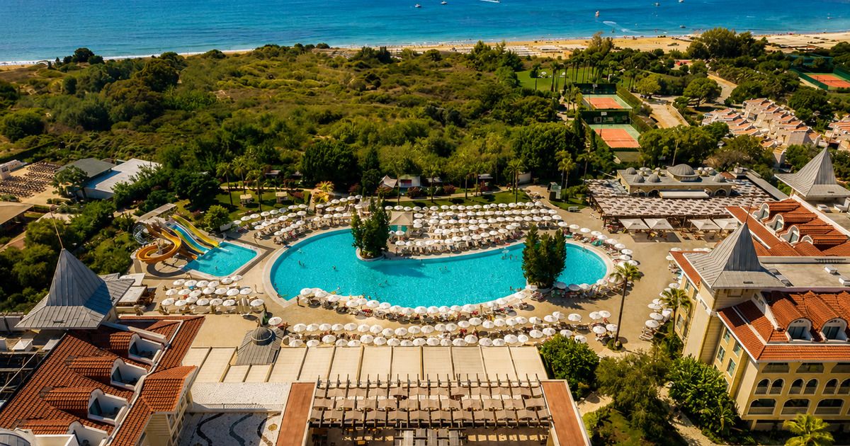 Hotel fitness centre with cardio machines, weight equipment and mirrored walls, Side Antalya