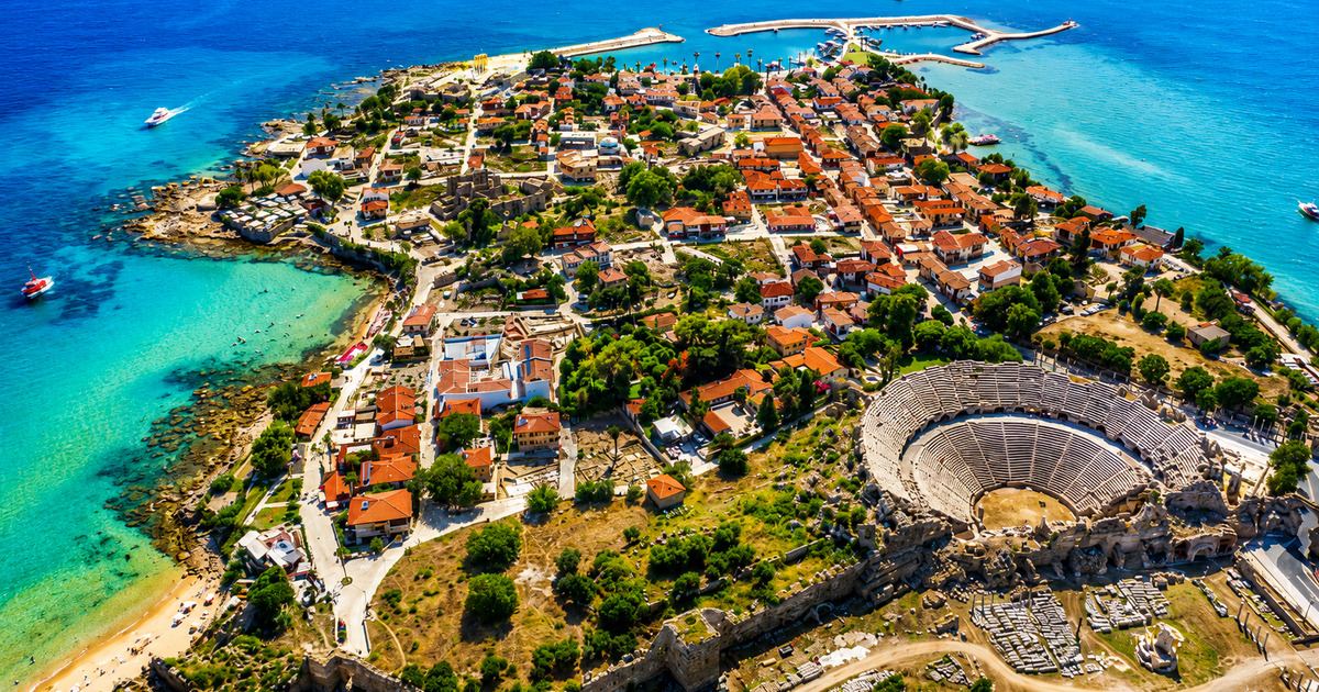 Aerial view of Side coastline with harbour, sandy beaches and blue Mediterranean water