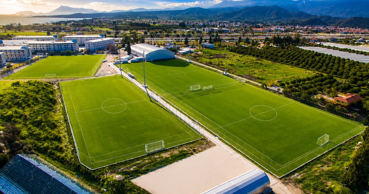 Aerial view of four professional football pitches at the sports complex in Kemer, Turkey