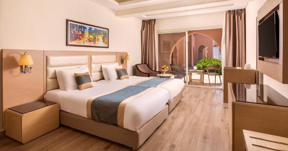 Aqua Vista hotel room — twin bed with balcony