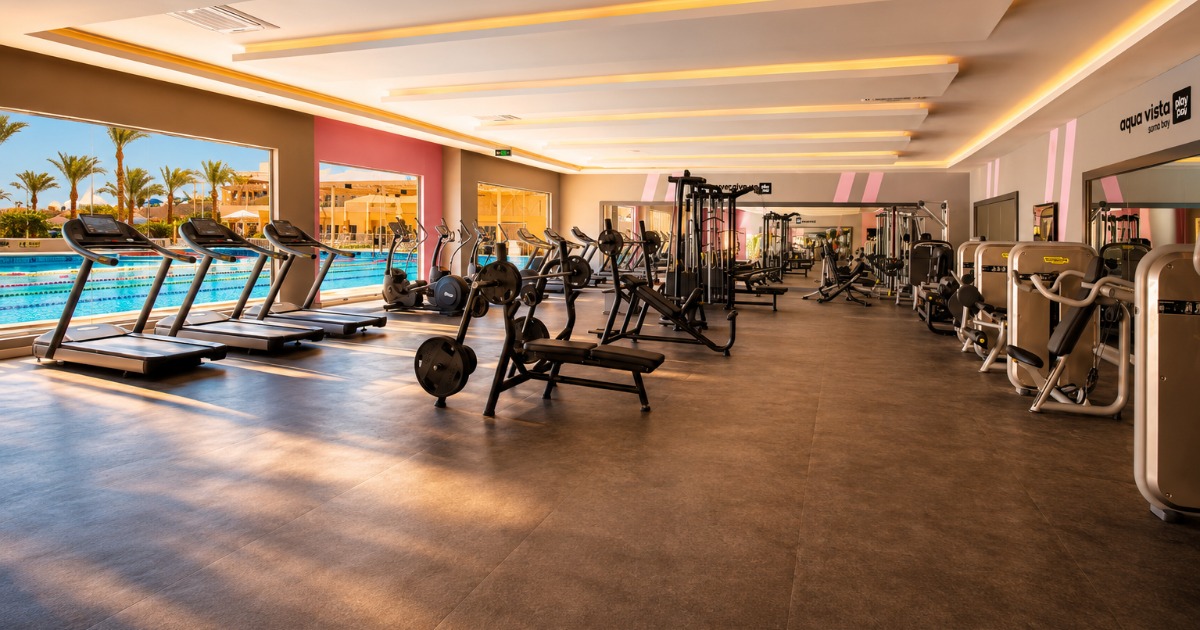 Aqua Vista fitness centre — full gym with Olympic pool view
